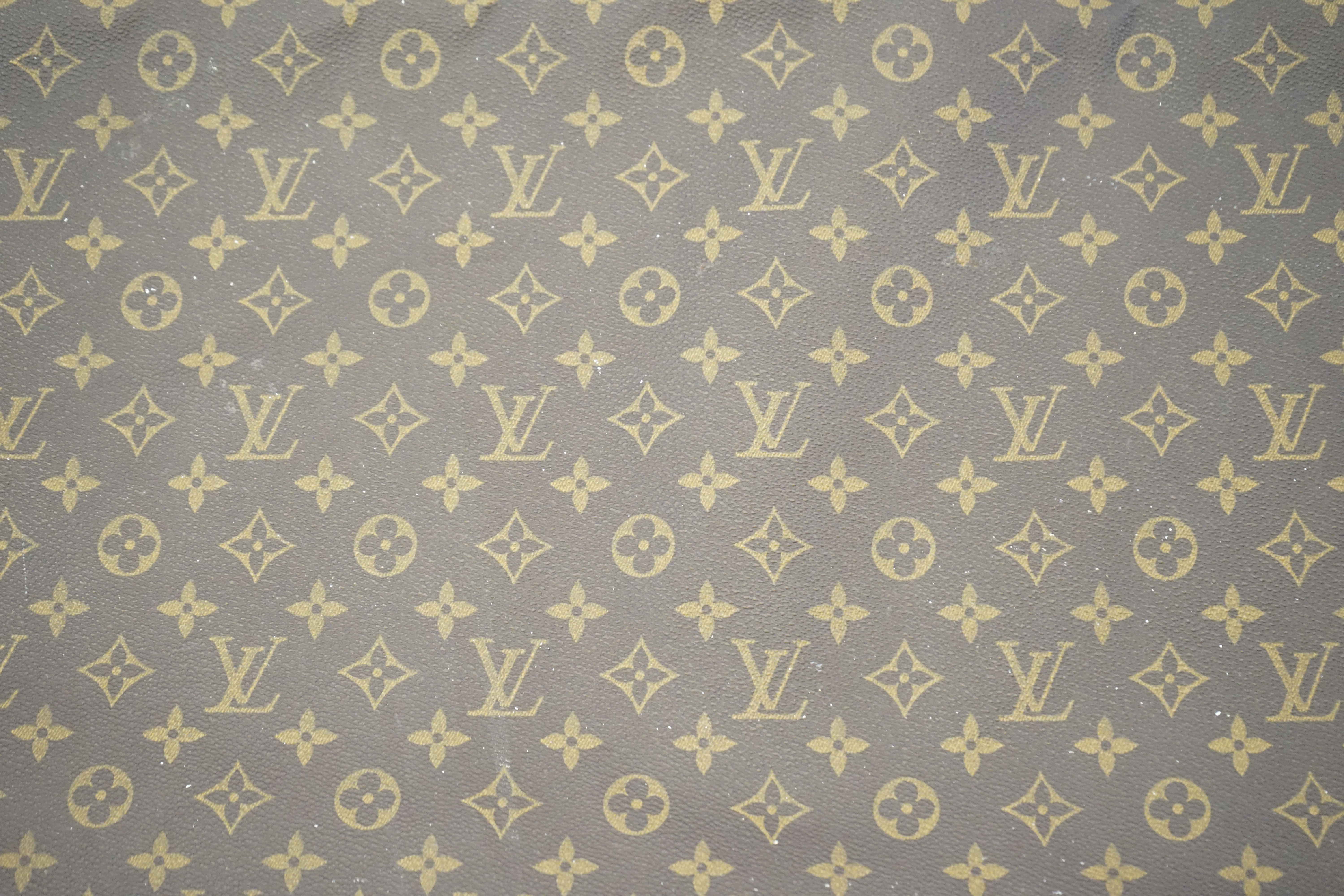 A Louis Vuitton special order folio case width 90cm, depth 4cm, height 63cm